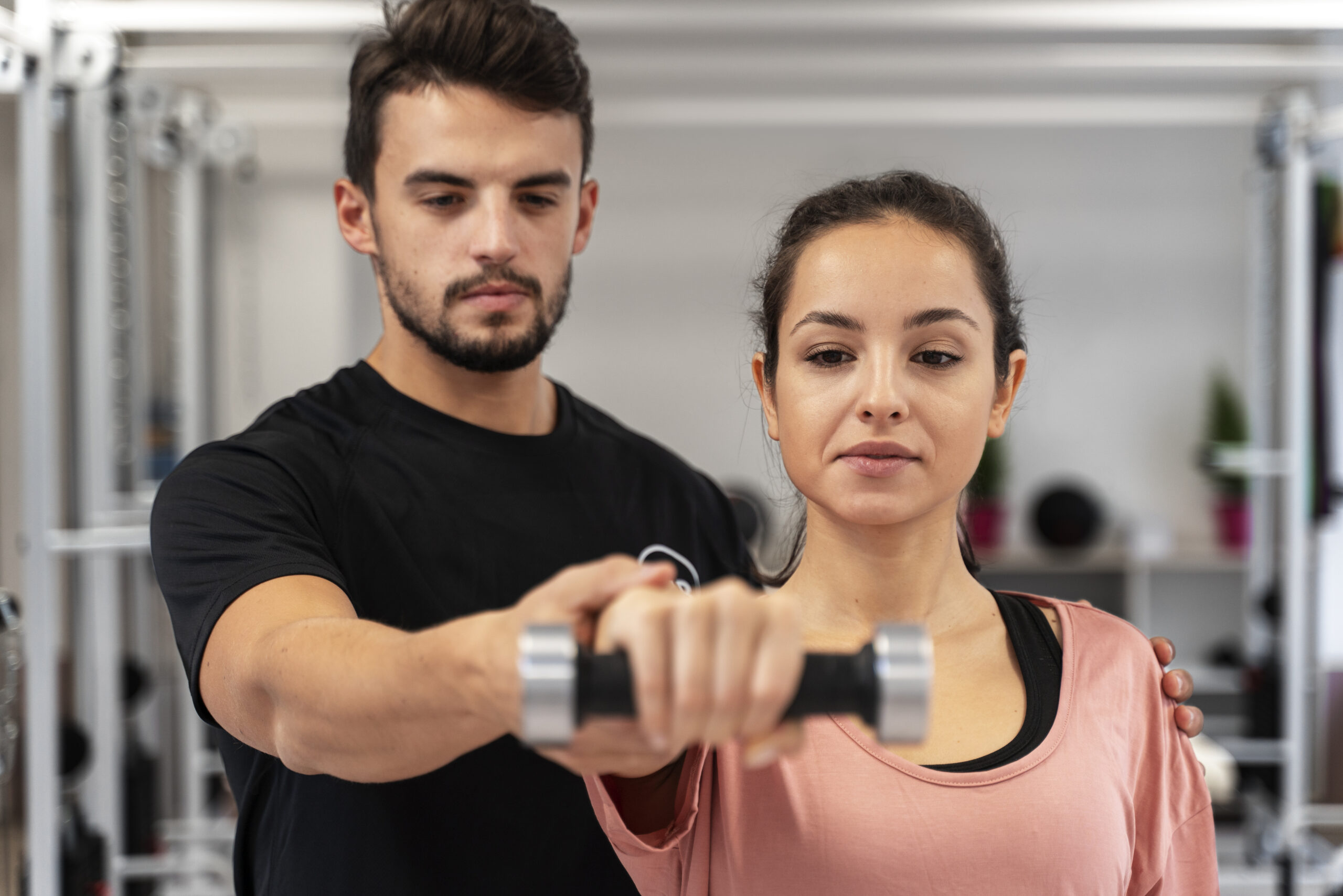 close-up-woman-exercising-with-dumbbell